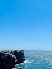 View of strong waves hitting the rock at Sagres, Algarve, Portugal.