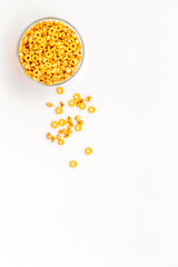 cereals, oatflakes and cornflakes for healthy breakfast on white background top view mock up