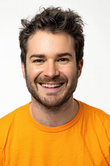 Fototapeta premium close up of yong handsome man smiling on white background