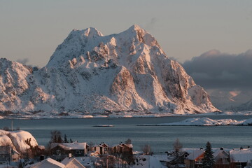 Arctic Village with Snowy Mountains