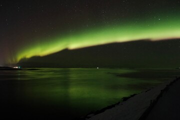 Stunning Northern Lights Over Water