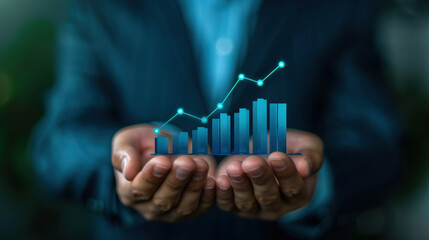 A businessman holding a digital graph with a growth trend, symbolizing business success and financial growth.