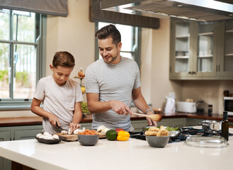 Cooking, father and son in kitchen, teaching or ingredients with time together, family or child...