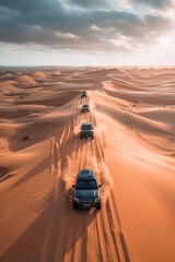 desert off-road adventure: 4x4 convoy traversing majestic sand dunes under dramatic sky in remote desert landscape - epic exploration and extreme adventure