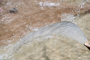 Water fountain in park, close-up of water splashing as water background