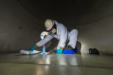 Male inspection thickness bottom into the tank stainless chemical area confined
