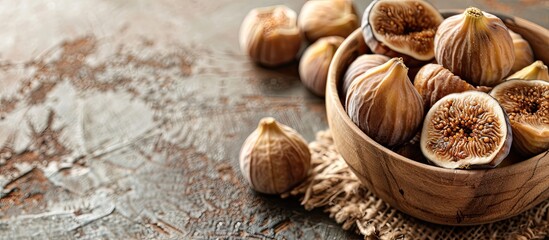 Dried figs are displayed on a table with ample copy space image for additional design elements