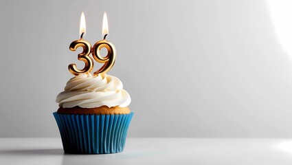 Gold Candle Number 39 on Blue Cupcake with Gray Background
