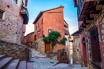 Detail of a medieval house on the corner of two streets in the old town of Albarracín, Teruel,...
