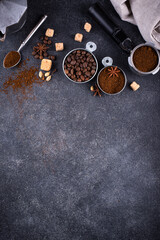 Grounded coffee, beans, coffe maker and spicces