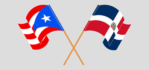 Crossed and waving flags of Puerto Rico and Dominican Republic