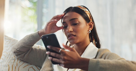 Woman, phone and stress in home with reading breakup message, fake news and online scam for...