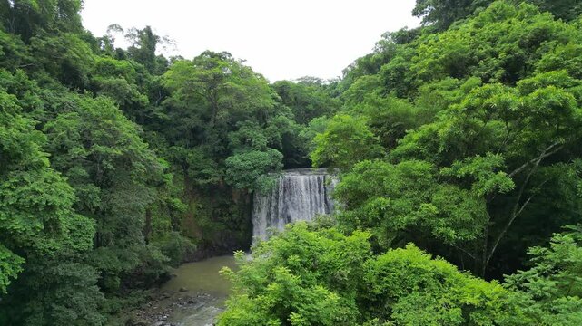 Aerial scenery of El Encanto waterfall surrounded by lush greens at the day in Esparza, Costa Rica