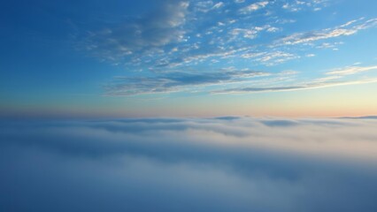 Fototapeta premium Beyond the clouds the horizon awaits