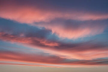 A sky at dawn with pink clouds