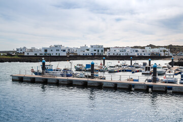 Fototapeta premium Port and houses of Orzola, Lanzarote,, Spain