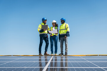 The engineer installs the solar panel, promoting the clean energy concept.