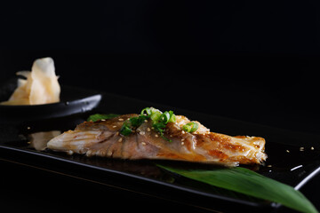 japanese white fish grilled japanese food seafood isolate in black background