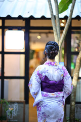 portrait woman with yukata dress in the garden