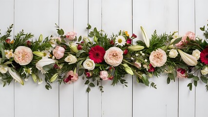 Festive flower composition on the white wooden background overhead view