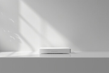 white sleek mobile router on wall
