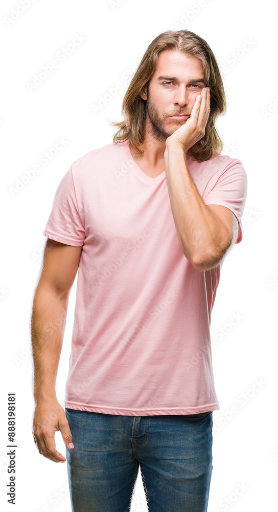 Poster Young handsome man with long hair over isolated background thinking looking tired and bored with depression problems with crossed arms.