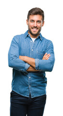 Fototapeta premium Young handsome man over isolated background happy face smiling with crossed arms looking at the camera. Positive person.