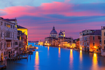 Obraz premium View of the Santa Maria della Salute dome in the Grand Canal at the evening, Venice, Italy