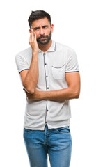 Fototapeta premium Adult hispanic man over isolated background thinking looking tired and bored with depression problems with crossed arms.