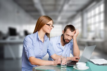 Fototapeta premium Male and female business colleagues work with documents and infographics