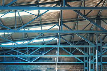 Metal trusses of ceiling of an industrial shop