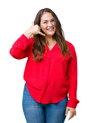 Beautiful plus size young business woman over isolated background smiling doing phone gesture with hand and fingers like talking on the telephone. Communicating concepts.