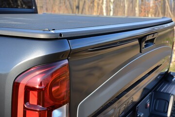 Turn cover on truck bed