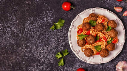 Roasted  meatballs with spaghetti.
