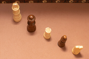 Chess pieces on chess board background	