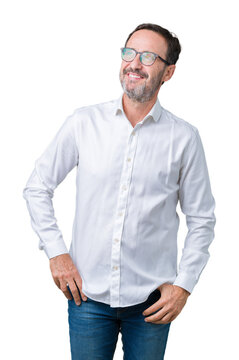 Handsome middle age elegant senior business man wearing glasses over isolated background smiling looking side and staring away thinking.