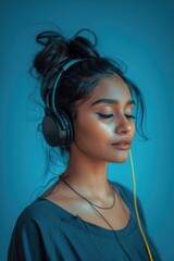 A lady listening to music, ideal for artistic portraits or product demos