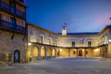 View of the Plaza Mayor of Albarracín, Teruel, Aragon, Spain, illuminated at dusk with the...