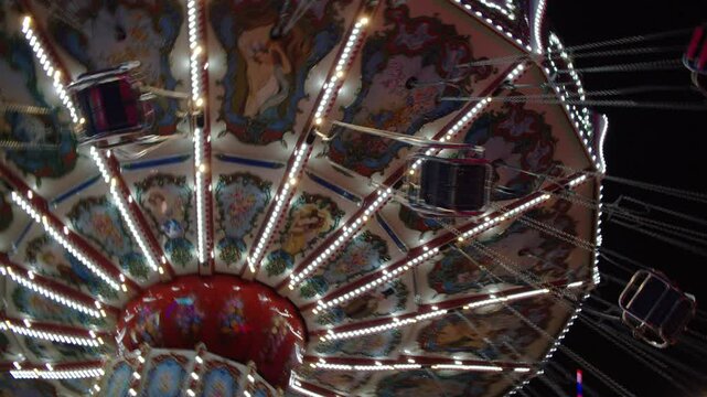 Texas State Fair flying chairs amusement park ride spinning in the night.�