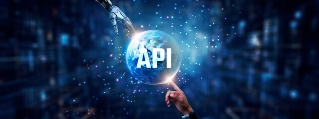 API: Application Programming Interface, Hands of robot and human touching on API global network connection, seamless integration, data exchange, automation, and artificial intelligence technology.
