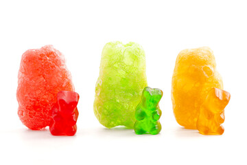 Row of Three Freeze Dried Gummy Bear Shaped Candies Isolated on a White Background