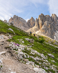 A group of tourists climbs the majestic Dolomites. Amazing picturesque mountain landscape of the Dolomites. South Tyrol, Italian Alps. Italian Dolomites