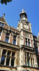 Fototapeta premium Historic Gothic Revival Clock Tower on a Sunny Day