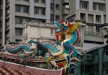 Historical Longshan (Lungshan) Temple roof dragon in central Taipei, Taiwan