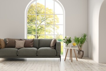 Fototapeta premium White living room with sofa and summer landscape in window. Scandinavian interior design. 3D illustration