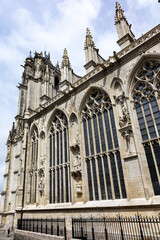 Fototapeta premium Fragment of Amiens Gothic Cathedral (Basilique Cathedrale Notre-Dame d'Amiens, 1220 - 1288). The south tower. Amiens, Somme, Picardie, France.