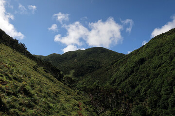 View of the hiking trail starting in Serra do Topo - Caldeira Santo Cristo - Fajã dos Cubres in São Jorge island, Azores, Portugal.