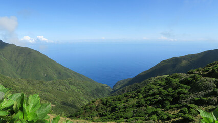 View of the hiking trail starting in Serra do Topo - Caldeira Santo Cristo - Fajã dos Cubres in São Jorge island, Azores, Portugal.