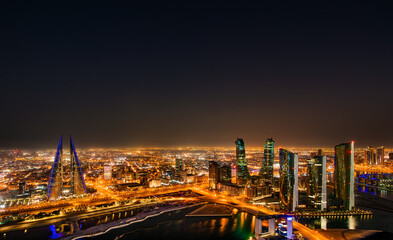 Enchanting night cityscapes of Manama, Bahrain, with its illuminated skyline, modern architecture, and vibrant nightlife. Perfect for travel enthusiasts seeking a glimpse of this Middle Eastern gem