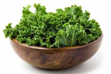 Fototapeta premium Green curly kale leaves in a white bowl macro shot